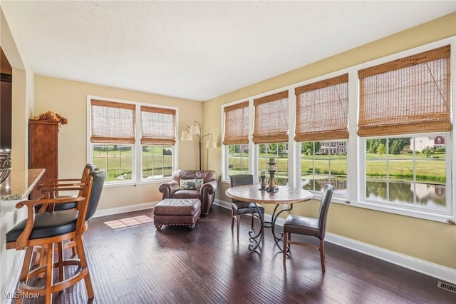 685 Shannon Pl, Aurora, OH 44202 - dining area with baseboards and dark wood-type flooring