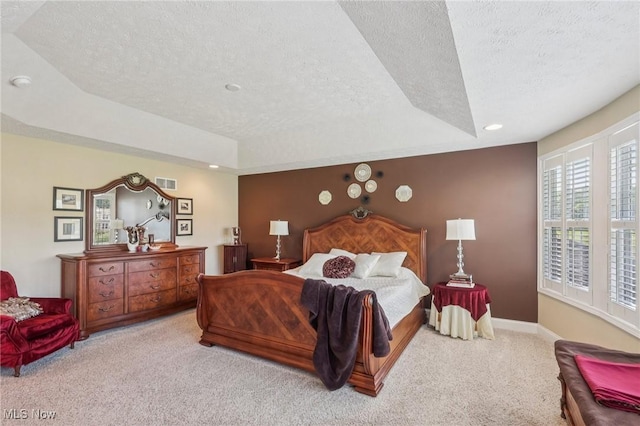 685 Shannon Pl, Aurora, OH 44202 - bedroom with a textured ceiling, carpet floors, a tray ceiling, and recessed lighting