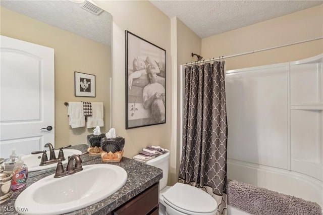 685 Shannon Pl, Aurora, OH 44202 - bathroom featuring a textured ceiling, vanity, and shower / bath combo with shower curtain