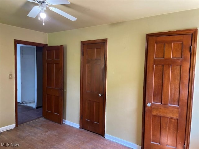 20171 Lake Shore Blvd, Euclid, OH 44123 - unfurnished bedroom featuring wood finished floors and a ceiling fan