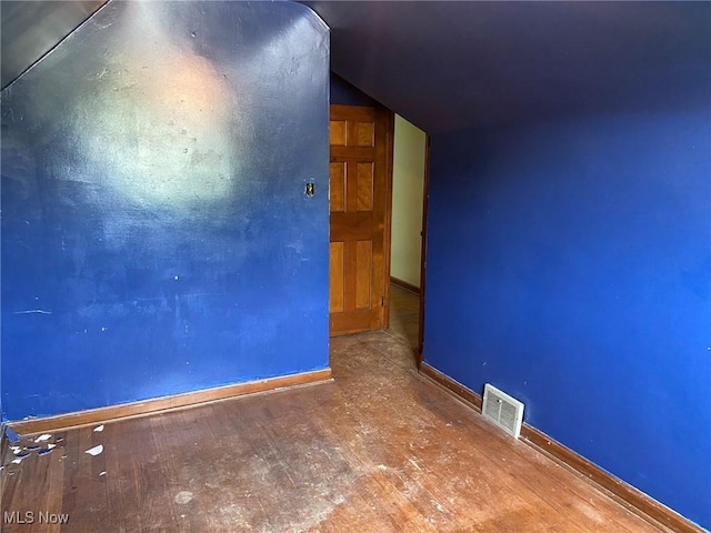 20171 Lake Shore Blvd, Euclid, OH 44123 - empty room featuring vaulted ceiling and wood finished floors