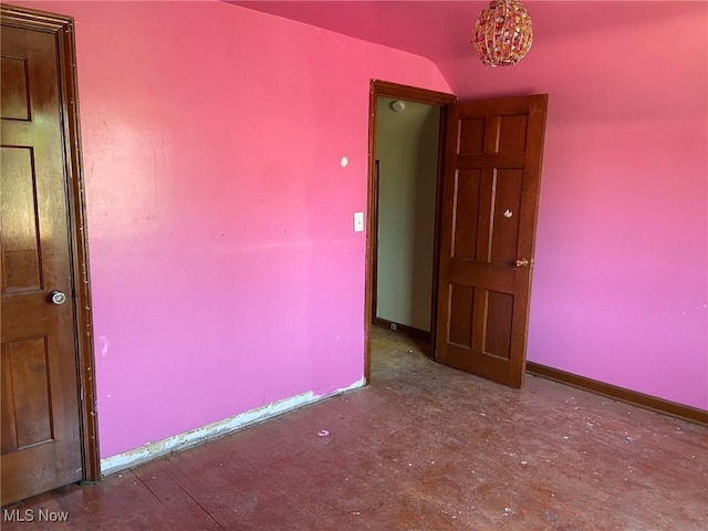 20171 Lake Shore Blvd, Euclid, OH 44123 - unfurnished room featuring baseboards and vaulted ceiling