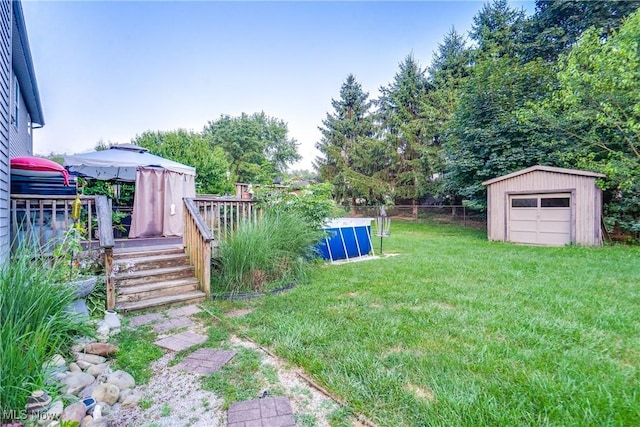 11912 Packets St NW, Canal Fulton, OH 44614 - view of yard with a wooden deck and a storage unit
