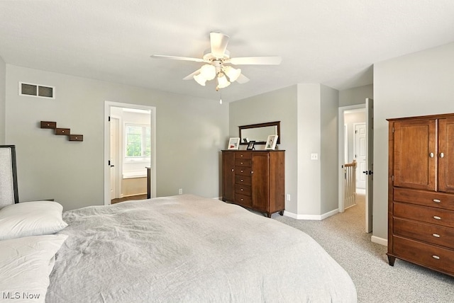 4020 Bishops Gate Cir, Stow, OH 44224 - bedroom featuring light colored carpet, a ceiling fan, and ensuite bath