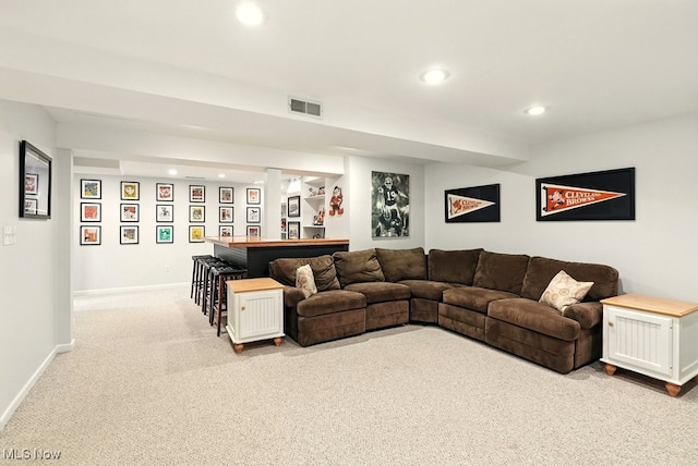 4020 Bishops Gate Cir, Stow, OH 44224 - living area featuring light carpet, recessed lighting, and bar area