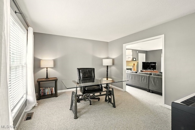 4020 Bishops Gate Cir, Stow, OH 44224 - office with healthy amount of natural light, carpet floors, and a fireplace
