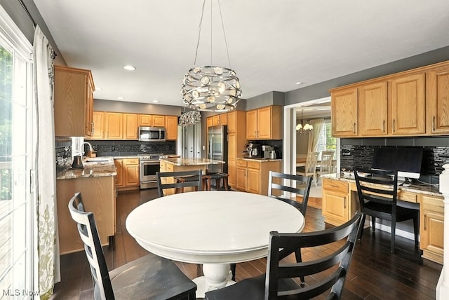 4020 Bishops Gate Cir, Stow, OH 44224 - dining room featuring a chandelier, dark wood-type flooring, and recessed lighting