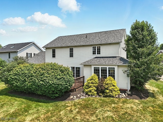 4020 Bishops Gate Cir, Stow, OH 44224 - back of property with a yard and roof with shingles