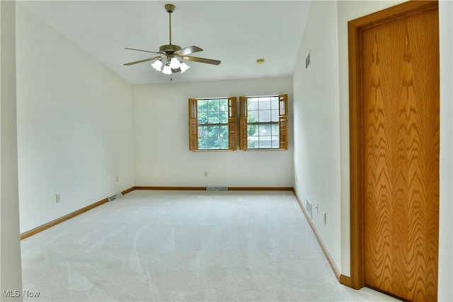106 N Aspen Ct Unit 4, Warren, OH 44484 - spare room featuring a ceiling fan and light carpet