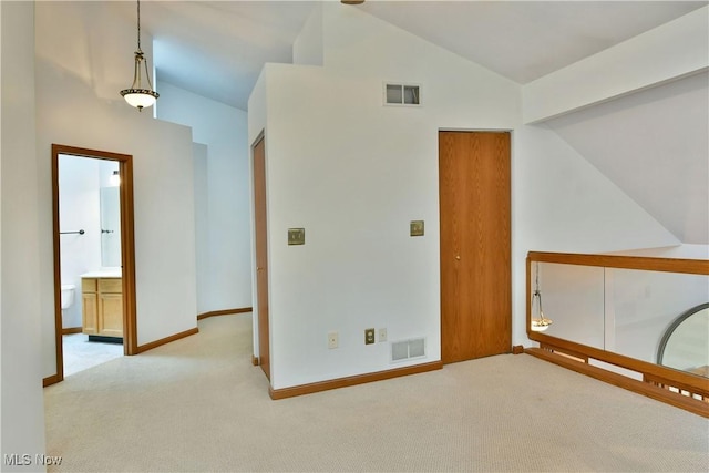 106 N Aspen Ct Unit 4, Warren, OH 44484 - spare room featuring carpet flooring and high vaulted ceiling