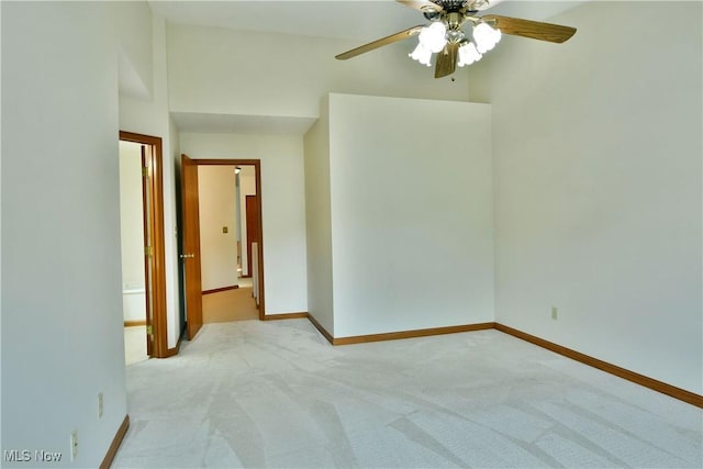 106 N Aspen Ct Unit 4, Warren, OH 44484 - empty room with light carpet and ceiling fan