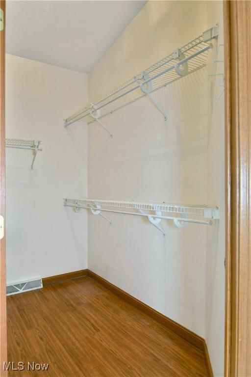 106 N Aspen Ct Unit 4, Warren, OH 44484 - spacious closet featuring wood finished floors
