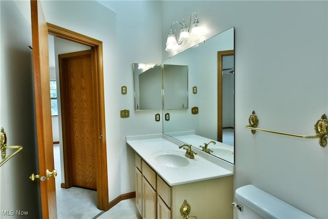 106 N Aspen Ct Unit 4, Warren, OH 44484 - bathroom with vanity and toilet