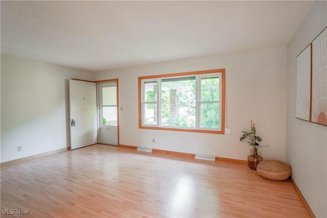 570 Rawlins Ave, New Franklin, OH 44319 - spare room with light wood finished floors and plenty of natural light