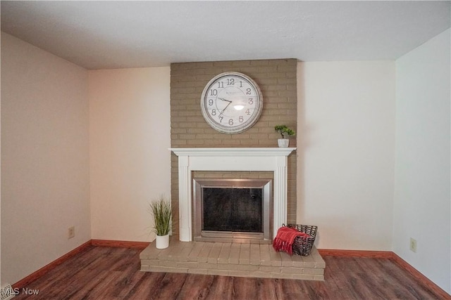570 Rawlins Ave, New Franklin, OH 44319 - unfurnished living room with wood finished floors and a fireplace