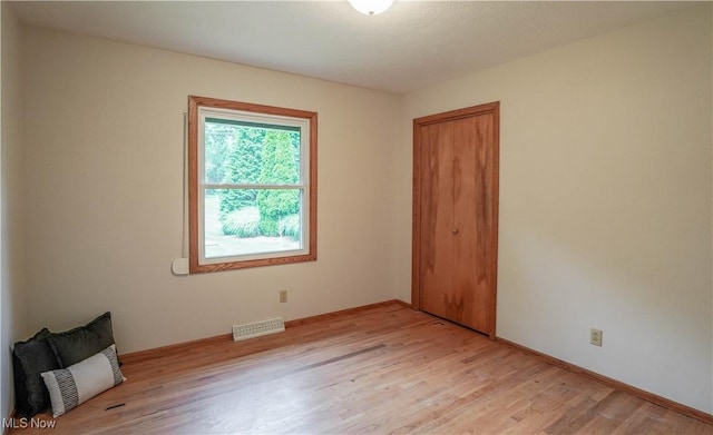 570 Rawlins Ave, New Franklin, OH 44319 - empty room featuring light wood finished floors and baseboards