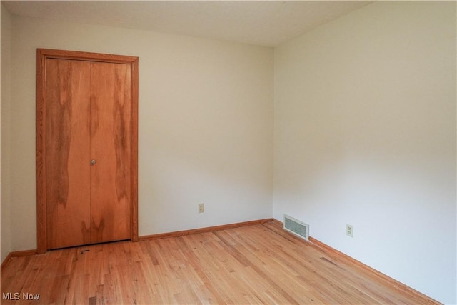 570 Rawlins Ave, New Franklin, OH 44319 - spare room featuring light wood-type flooring and baseboards
