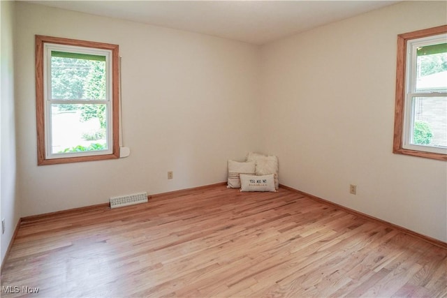 570 Rawlins Ave, New Franklin, OH 44319 - empty room with wood finished floors and baseboards