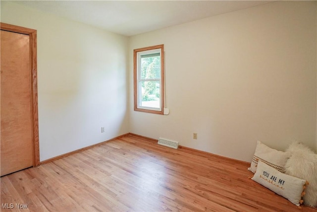 570 Rawlins Ave, New Franklin, OH 44319 - unfurnished bedroom with light wood-type flooring