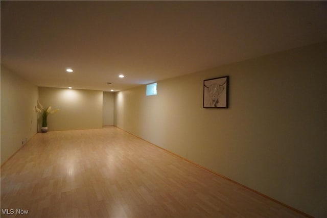 570 Rawlins Ave, New Franklin, OH 44319 - below grade area featuring wood finished floors and recessed lighting