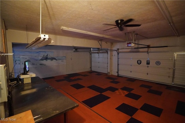 570 Rawlins Ave, New Franklin, OH 44319 - garage featuring a ceiling fan and a garage door opener