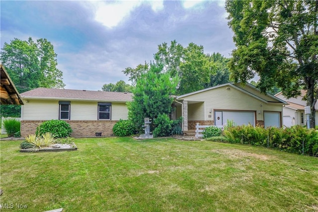 570 Rawlins Ave, New Franklin, OH 44319 - ranch-style house with brick siding and a front lawn