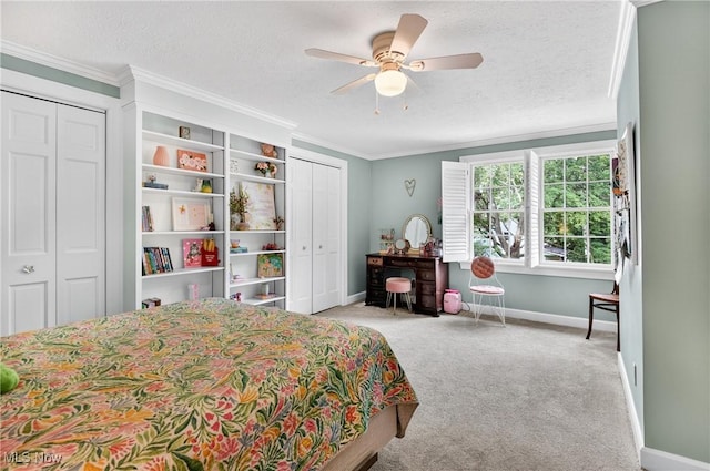 335 N Union Ave, Salem, OH 44460 - bedroom with two closets, carpet flooring, crown molding, a textured ceiling, and a ceiling fan