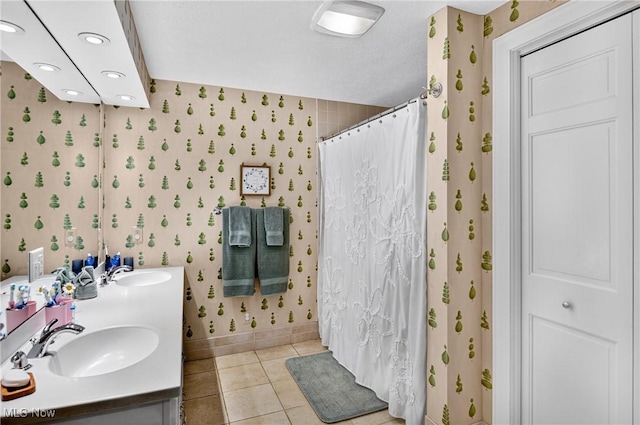 335 N Union Ave, Salem, OH 44460 - full bath with wallpapered walls, tile patterned flooring, double vanity, recessed lighting, and curtained shower