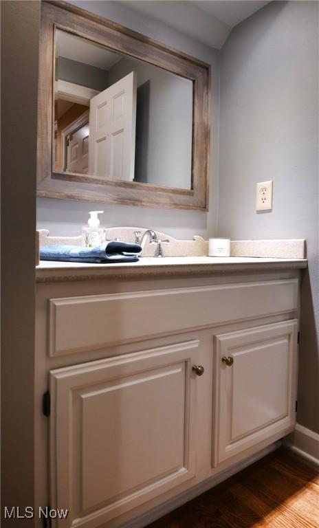 335 N Union Ave, Salem, OH 44460 - bathroom featuring vanity and wood finished floors
