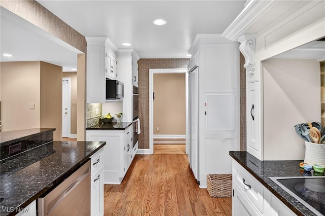 335 N Union Ave, Salem, OH 44460 - kitchen featuring light wood finished floors, white cabinetry, dark stone countertops, recessed lighting, and dishwasher