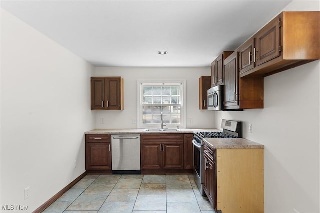 1241 Sparhawk Ave, Akron, OH 44305 - kitchen featuring stainless steel appliances and light countertops
