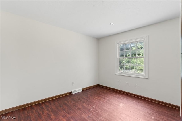 1241 Sparhawk Ave, Akron, OH 44305 - empty room with dark wood-type flooring and recessed lighting