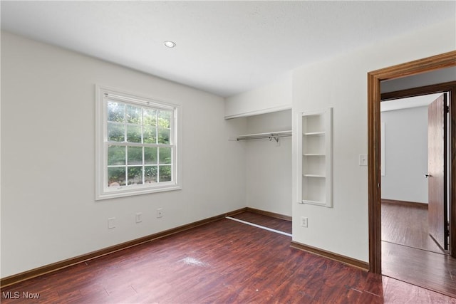 1241 Sparhawk Ave, Akron, OH 44305 - unfurnished bedroom with wood finished floors, a closet, and recessed lighting