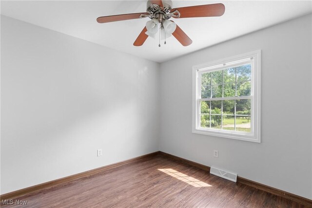1241 Sparhawk Ave, Akron, OH 44305 - empty room featuring wood finished floors and ceiling fan