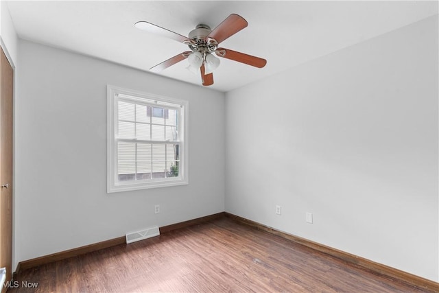 1241 Sparhawk Ave, Akron, OH 44305 - unfurnished room featuring wood finished floors and ceiling fan
