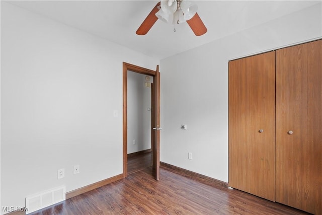 1241 Sparhawk Ave, Akron, OH 44305 - unfurnished bedroom featuring a closet, wood finished floors, and ceiling fan