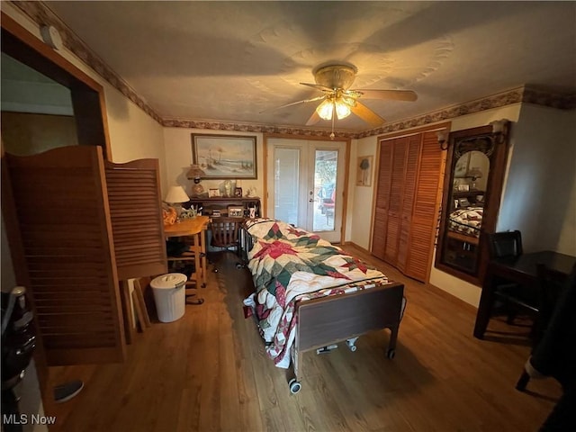 444 5th St NW, New Philadelphia, OH 44663 - bedroom featuring wood finished floors and ceiling fan