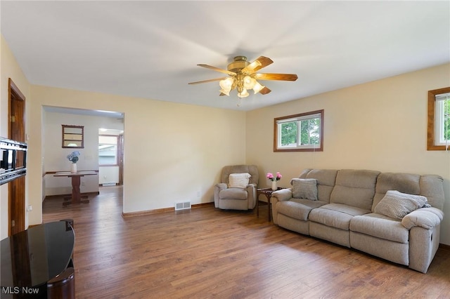 2045 Overland Ave NE, Warren, OH 44483 - living room featuring wood finished floors and ceiling fan