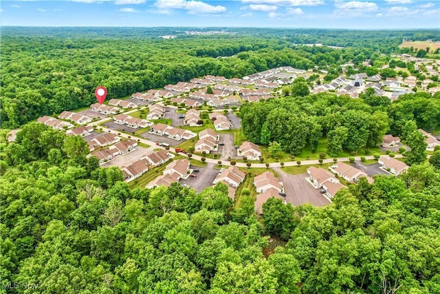 3310 Trappers Trl Unit C, Cortland, OH 44410 - aerial overview of property's location featuring a heavily wooded area and nearby suburban area