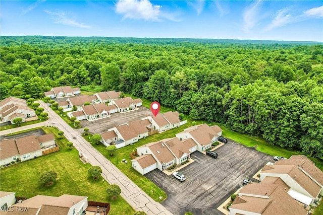 3310 Trappers Trl Unit C, Cortland, OH 44410 - aerial view of residential area featuring a heavily wooded area