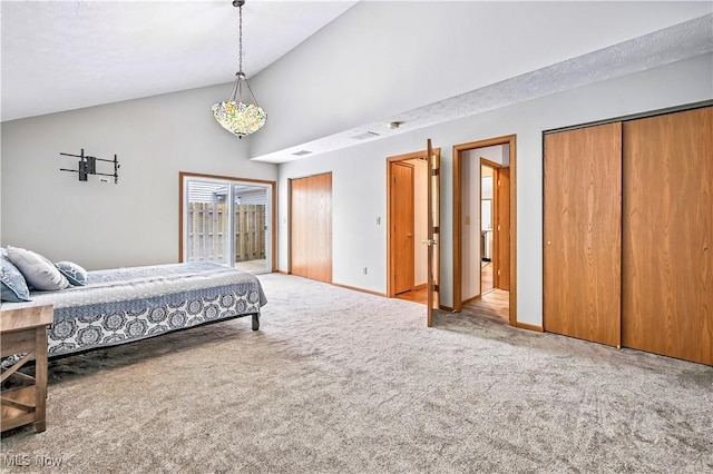 3310 Trappers Trl Unit C, Cortland, OH 44410 - bedroom with multiple closets, carpet, and high vaulted ceiling