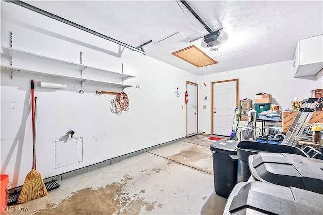 3310 Trappers Trl Unit C, Cortland, OH 44410 - garage featuring a garage door opener