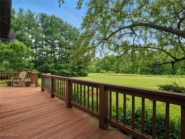 19070 Ridgeview Trl, Chagrin Falls, OH 44023 - wooden terrace featuring a lawn and view of wooded area