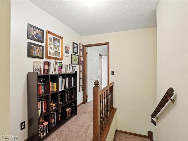 19070 Ridgeview Trl, Chagrin Falls, OH 44023 - corridor with an upstairs landing, carpet, and a textured ceiling