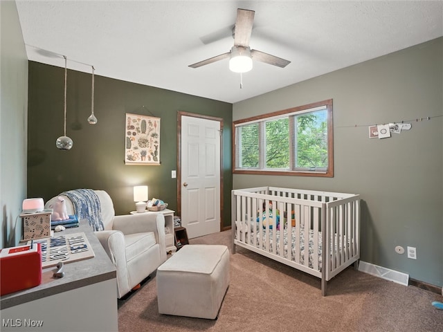 19070 Ridgeview Trl, Chagrin Falls, OH 44023 - carpeted bedroom featuring a crib and ceiling fan