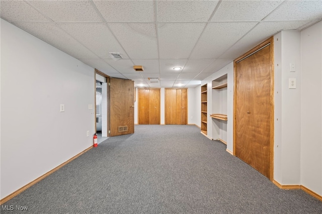 3016 Clague Rd, North Olmsted, OH 44070 - finished basement with a paneled ceiling and carpet