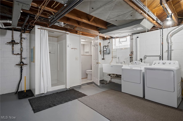 3016 Clague Rd, North Olmsted, OH 44070 - basement featuring washer and dryer and a sink