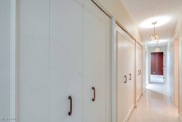1012 Bunker Dr Unit 307, Akron, OH 44333 - hallway with light tile patterned floors