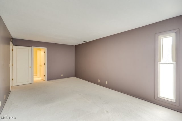 1012 Bunker Dr Unit 307, Akron, OH 44333 - carpeted empty room with baseboards
