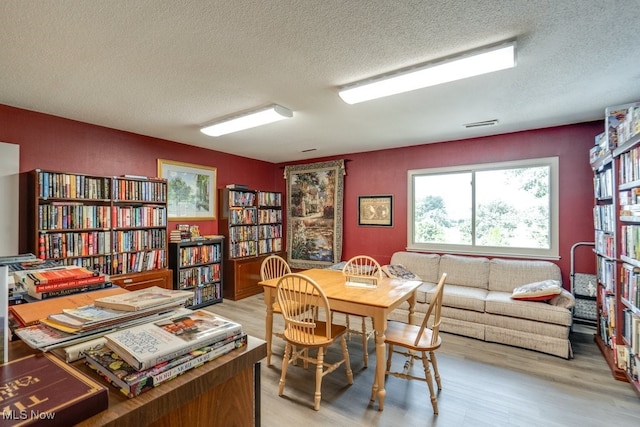 1012 Bunker Dr Unit 307, Akron, OH 44333 - office with a textured ceiling and light wood-type flooring